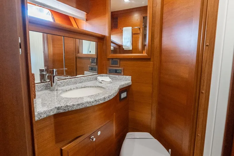 Slide: The Image of Luxurious 2016 Grand Banks 72 Aleutian RP yacht interior with shower and cozy cabin. - 112