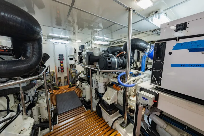 Slide: The Image of Engine room of 2016 Grand Banks 72 Aleutian RP yacht, featuring advanced machinery and equipment. - 121