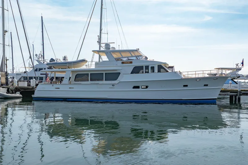 Slide: The Image of 2016 Grand Banks 72 Aleutian RP yacht docked at marina, side view. - 136