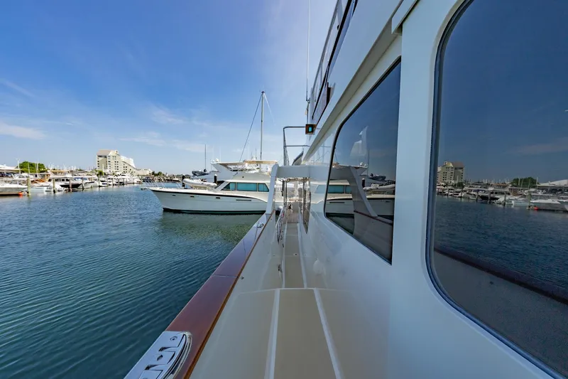 Slide: The Image of 2016 Grand Banks 72 Aleutian RP yacht deck with elegant wood flooring and sleek design. - 17