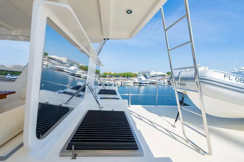 Slide: The Image of Flybridge of 2016 Grand Banks 72 Aleutian RP yacht with outdoor kitchen and seating. - 26