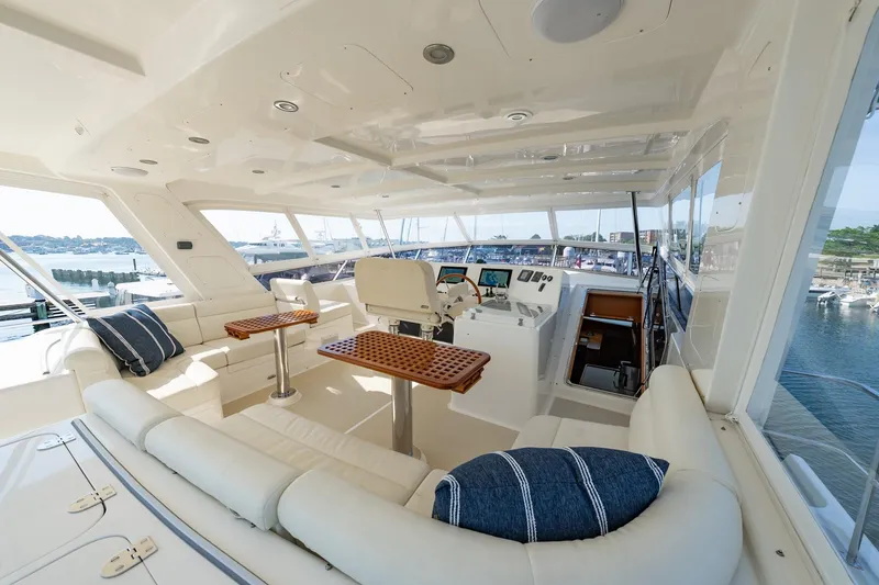 Slide: The Image of Luxurious 2016 Grand Banks 72 Aleutian RP yacht interior with elegant seating and helm station. - 29