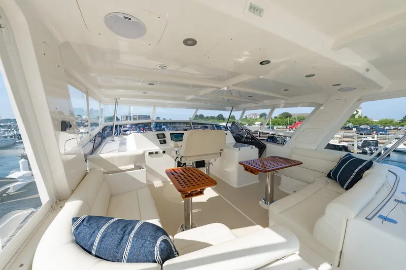 Slide: The Image of Luxurious interior of 2016 Grand Banks 72 Aleutian RP yacht with plush seating and helm. - 30