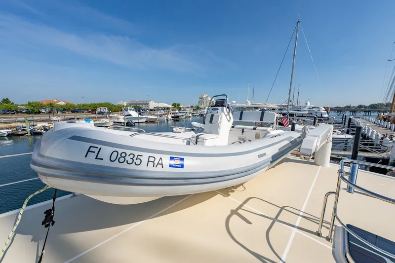 Slide: The Image of 2016 Grand Banks 72 Aleutian RP yacht with solar panels docked at marina. - 42