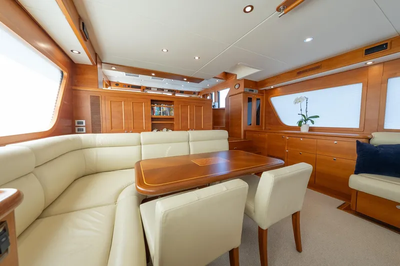 Slide: The Image of Luxurious interior of 2016 Grand Banks 72 Aleutian RP yacht with elegant seating and wood finishes. - 49