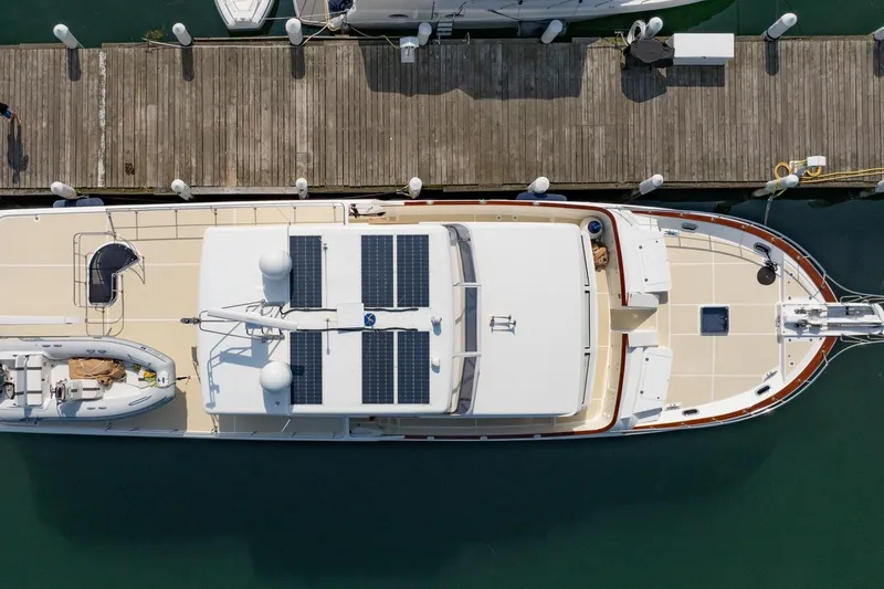 Slide: The Image of 2016 Grand Banks 72 Aleutian RP yacht docked at a marina. - 5