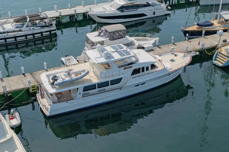 Slide: The Image of Overhead view of 2016 Grand Banks 72 Aleutian RP yacht docked at marina. - 6