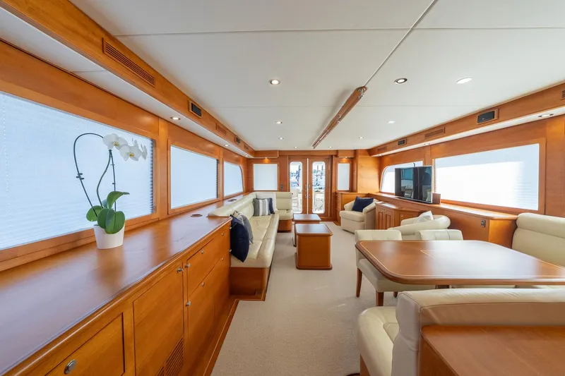 Slide: The Image of Electrical panel inside 2016 Grand Banks 72 Aleutian RP yacht, featuring elegant wood interior. - 60
