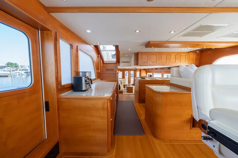 Slide: The Image of Luxurious interior of 2016 Grand Banks 72 Aleutian RP yacht with elegant wood finishes. - 61