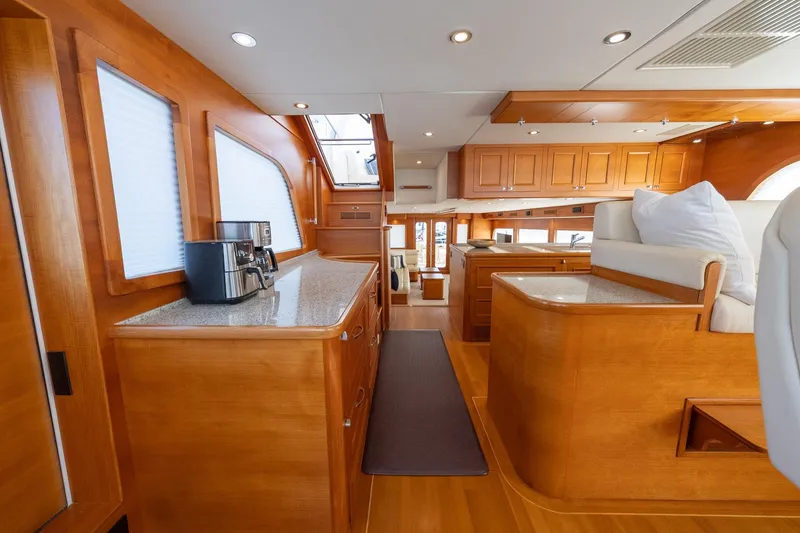 Slide: The Image of Luxurious interior of 2016 Grand Banks 72 Aleutian RP yacht with elegant wood finishes. - 62