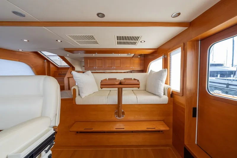 Slide: The Image of Luxurious interior of 2016 Grand Banks 72 Aleutian RP yacht with elegant wood finishes. - 64