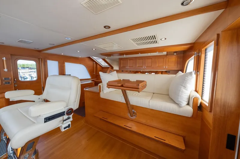 Slide: The Image of Luxurious interior of 2016 Grand Banks 72 Aleutian RP yacht with wooden finishes. - 65