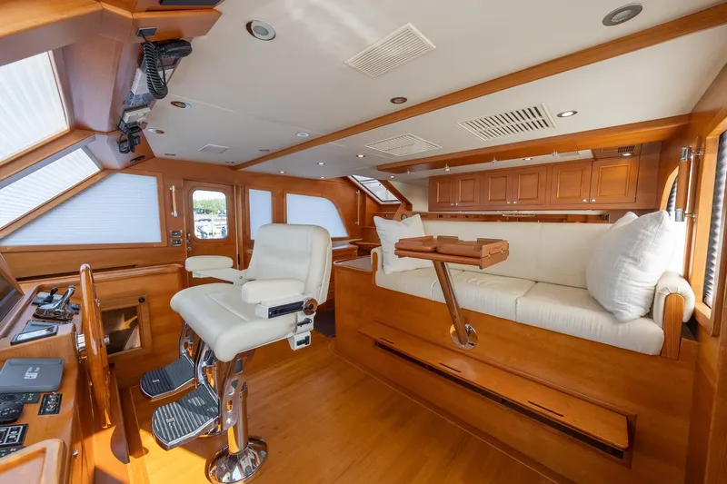 Slide: The Image of Luxurious interior of 2016 Grand Banks 72 Aleutian RP yacht with elegant wood finish. - 67