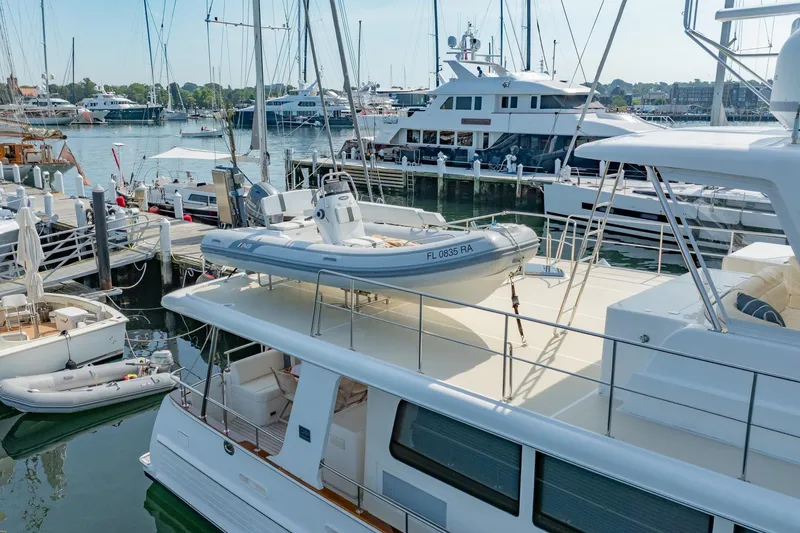 Slide: The Image of 2016 Grand Banks 72 Aleutian RP yacht docked at marina, aerial view. - 7