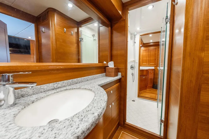 Slide: The Image of Luxurious wooden bathroom interior of 2016 Grand Banks 72 Aleutian RP yacht. - 82