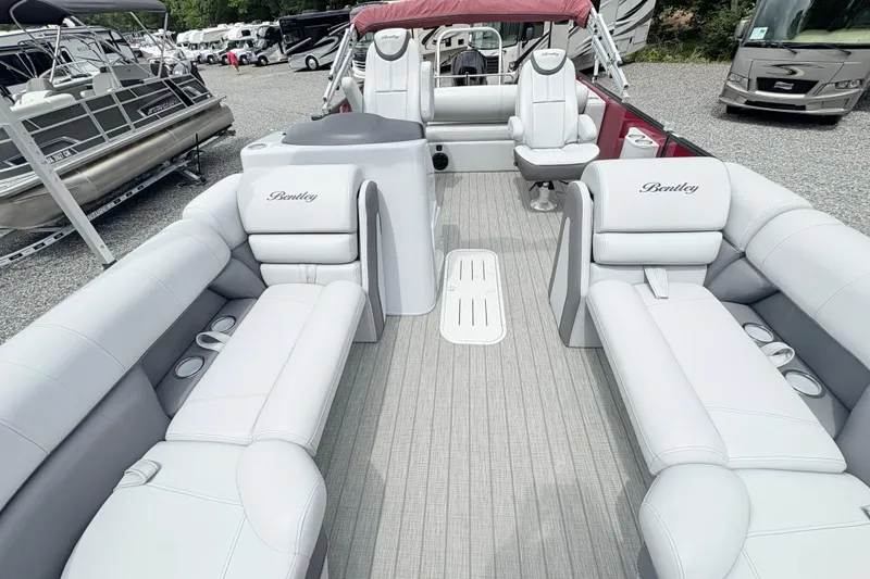 Slide: The Image of 2022 Bentley Pontoons 223 Elite interior with luxurious seating and modern design. - 18
