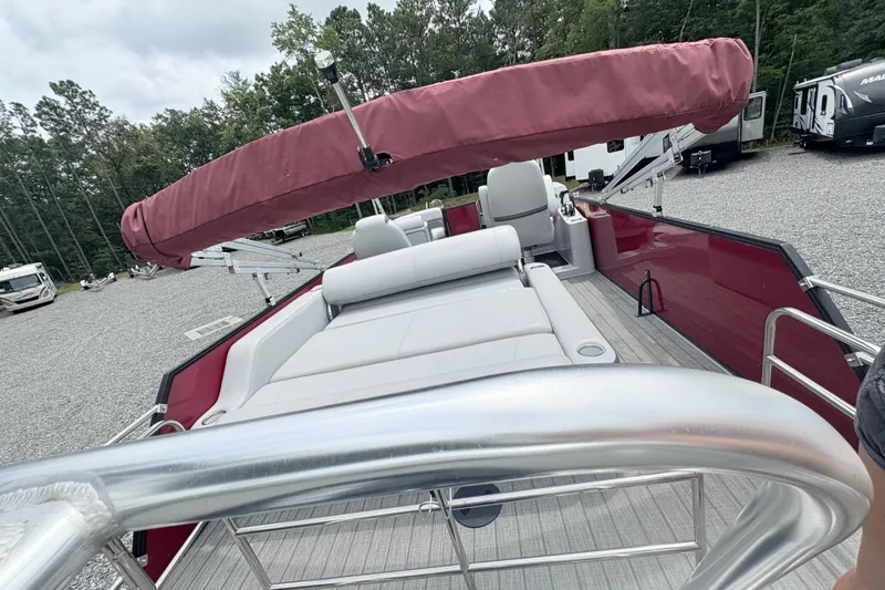 Slide: The Image of 2022 Bentley Pontoons 223 Elite with red canopy and spacious seating area. - 20
