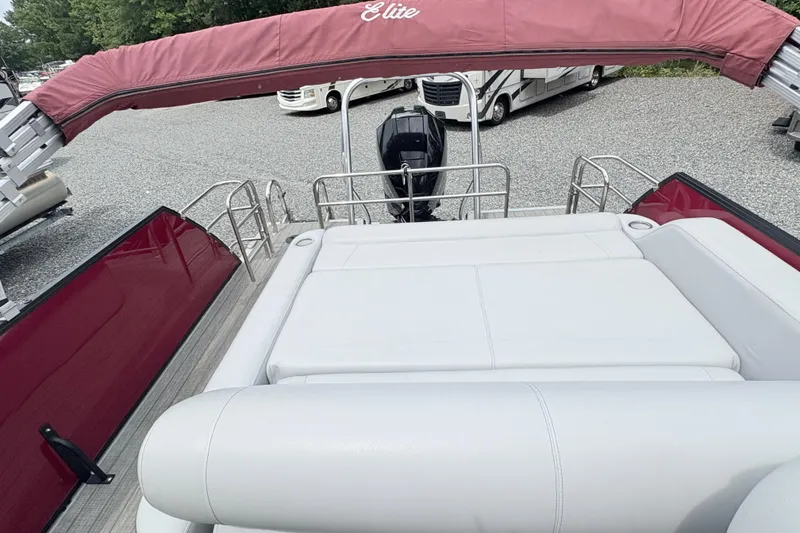Slide: The Image of 2022 Bentley Pontoons 223 Elite with red canopy and spacious seating area. - 9