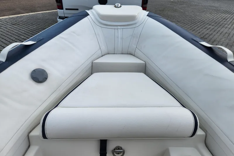 Slide: The Image of 2019 Novurania DL 400 boat interior with white seating and sleek design. - 14