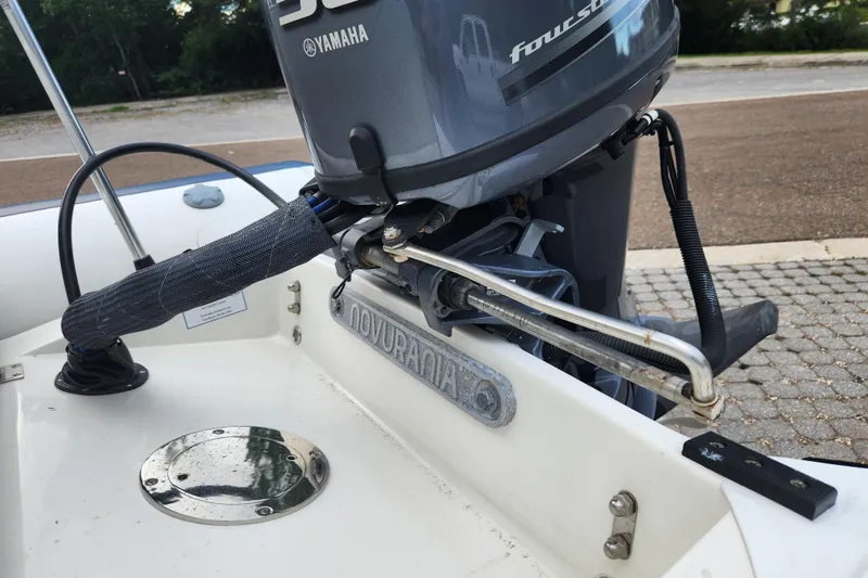 Slide: The Image of 2019 Novurania DL 400 boat with Yamaha outboard motor, close-up view. - 38