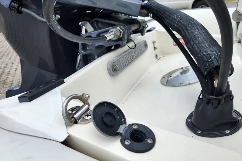 Slide: The Image of 2019 Novurania DL 400 boat engine compartment with cables and fittings. - 39