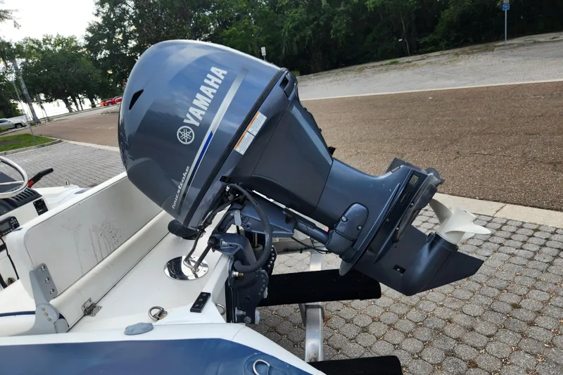Slide: The Image of 2019 Novurania DL 400 with Yamaha outboard motor, parked on a paved area. - 44