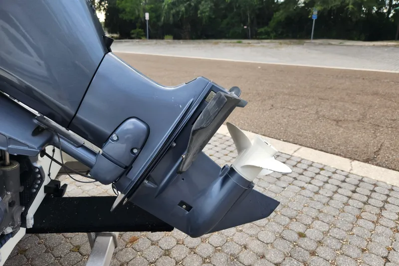 Slide: The Image of Outboard motor of a 2019 Novurania DL 400 boat on a paved surface. - 45
