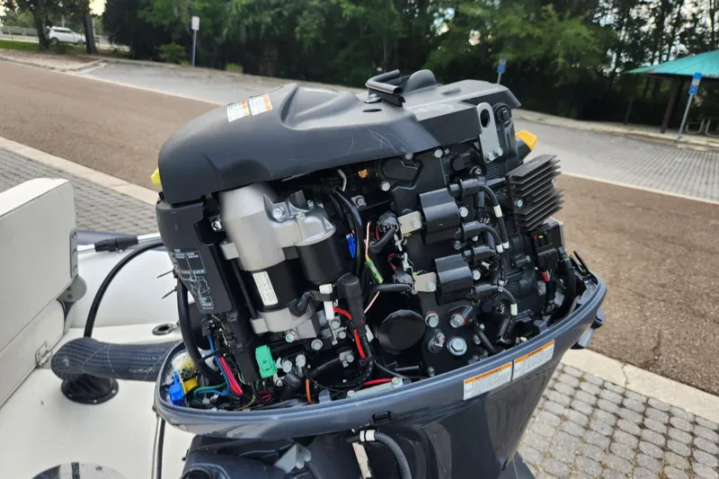 Slide: The Image of 2019 Novurania DL 400 outboard motor with exposed engine components. - 46