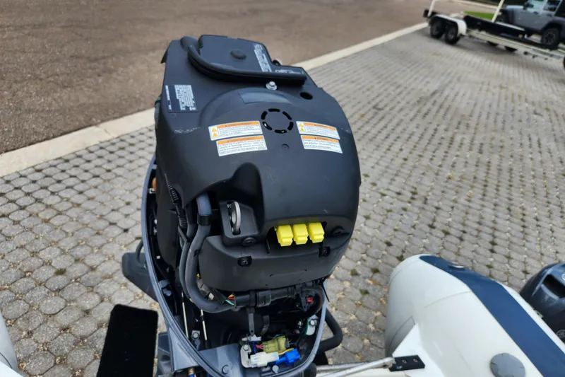 Slide: The Image of 2019 Novurania DL 400 outboard motor on a paved surface. - 49
