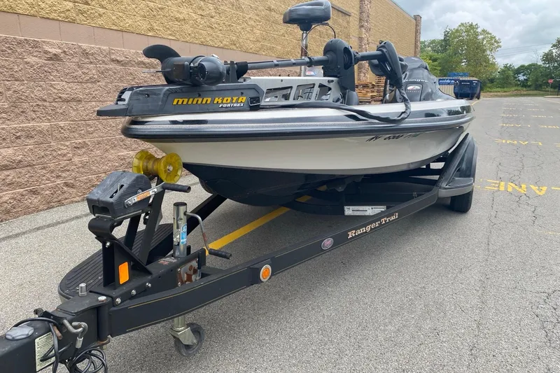 Slide: The Image of 2009 Ranger Z520 Comanche boat on trailer, featuring Minn Kota Fortrex motor. - 3