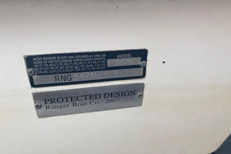 Slide: The Image of 2009 Ranger Z520 Comanche boat model and patent information plates. - 9