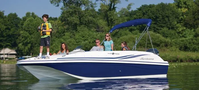 Slide: The Image of Manufacturer Provided Image: 2013 Hurricane SunDeck Sport 188 OB boat with family enjoying a day on the lake. - 23