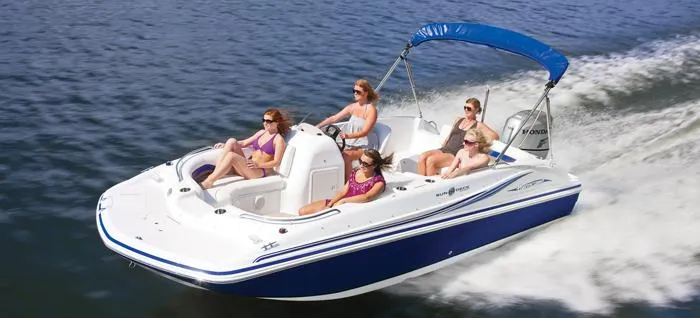 Slide: The Image of Manufacturer Provided Image: 2013 Hurricane SunDeck Sport 188 OB boat cruising on water with passengers. - 25