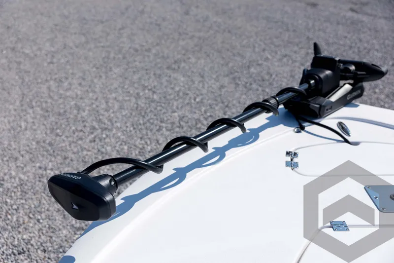 Slide: The Image of Tidewater 2410 Bay Max 2026 boat with Garmin trolling motor on deck. - 10