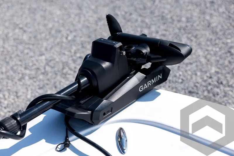 Slide: The Image of Tidewater 2410 Bay Max 2026 with Garmin trolling motor on deck. - 11