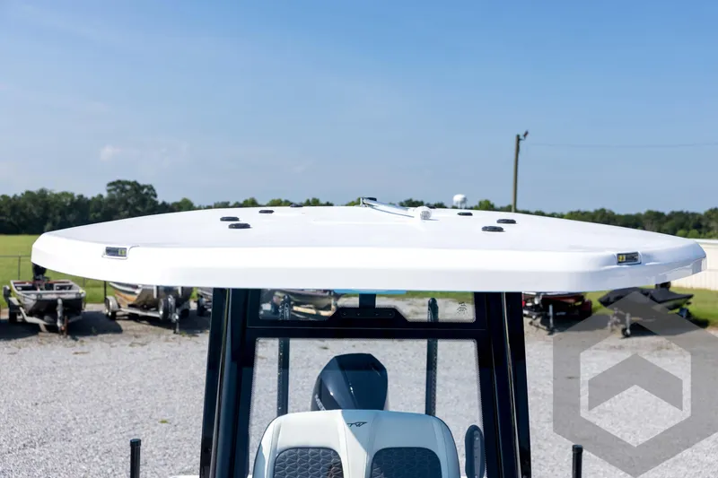 Slide: The Image of 2026 Tidewater 2410 Bay Max boat, white top view, outdoor display. - 29