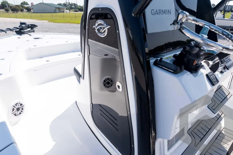 Slide: The Image of 2026 Tidewater 2410 Bay Max boat interior with Garmin navigation system. - 31