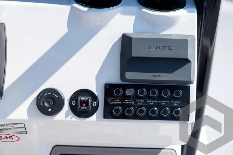 Slide: The Image of Control panel of 2026 Tidewater 2410 Bay Max boat with JL Audio system. - 39