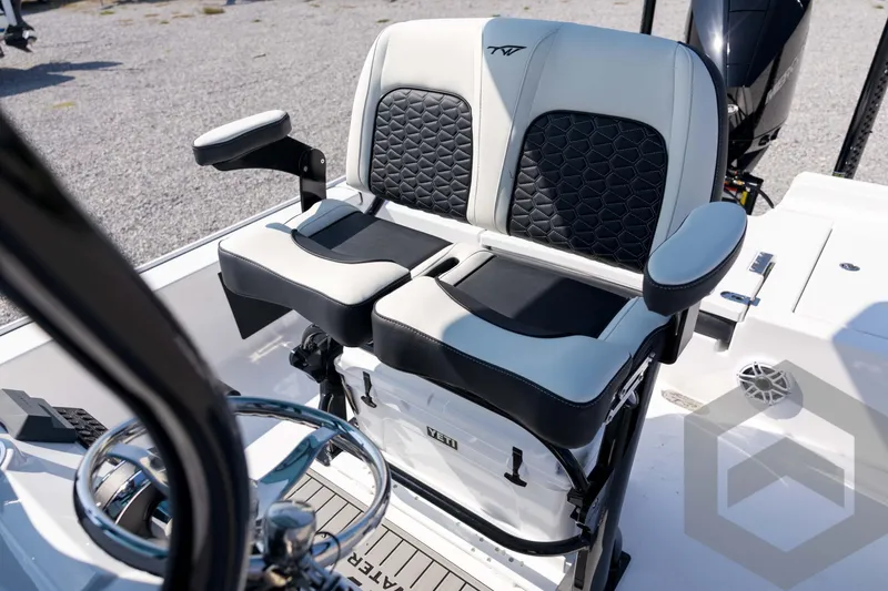 Slide: The Image of 2026 Tidewater 2410 Bay Max boat seats with black and white upholstery, featuring armrests. - 46