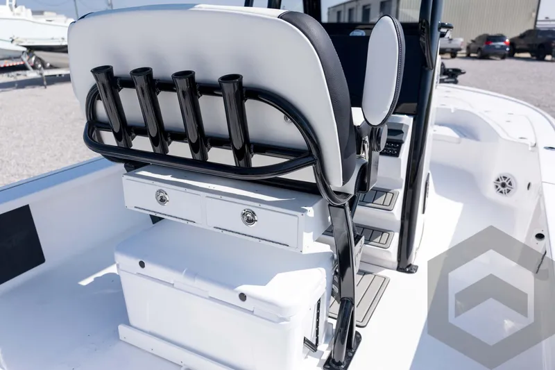 Slide: The Image of 2026 Tidewater 2410 Bay Max boat interior with rod holders and storage compartments. - 57