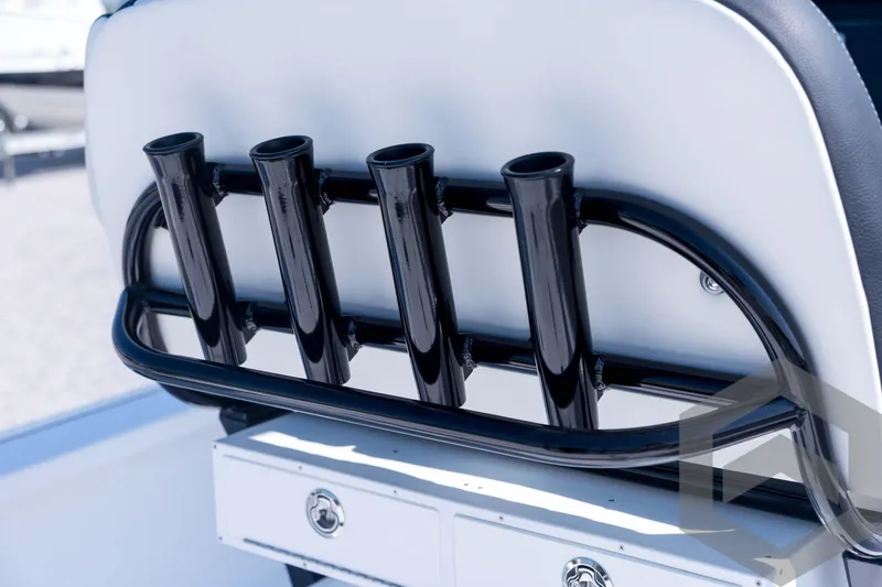 Slide: The Image of Rod holders on a 2026 Tidewater 2410 Bay Max boat, featuring sleek black design. - 58