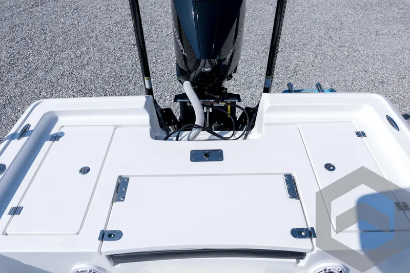 Slide: The Image of 2026 Tidewater 2410 Bay Max boat stern with motor and storage compartments. - 64