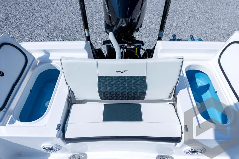 Slide: The Image of 2026 Tidewater 2410 Bay Max boat interior with seating and storage compartments. - 65