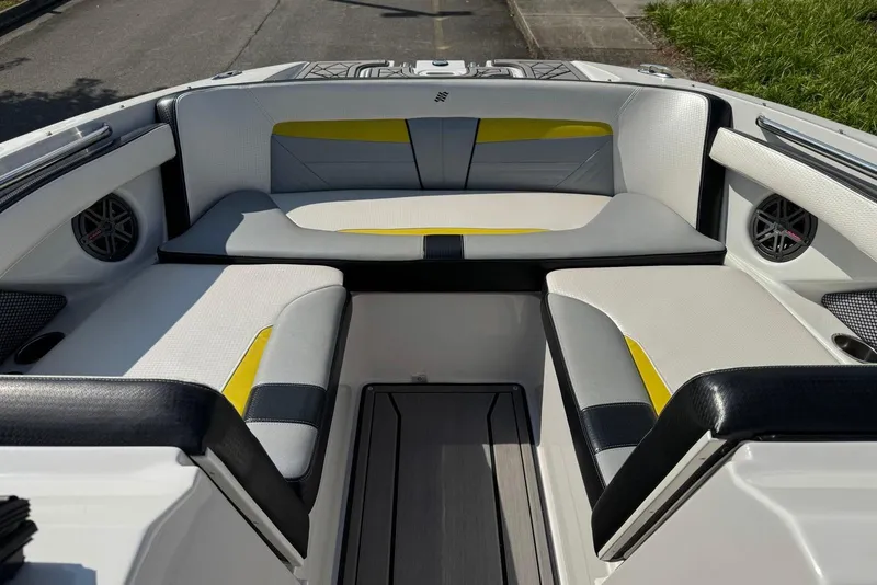 Slide: The Image of 2017 Four Winns TS242 boat interior with stylish seating and modern design. - 8