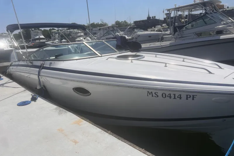 Slide: The Image of 2003 Coblat 263 boat docked at marina, sunny day, registration MS 0414 PF. - 13