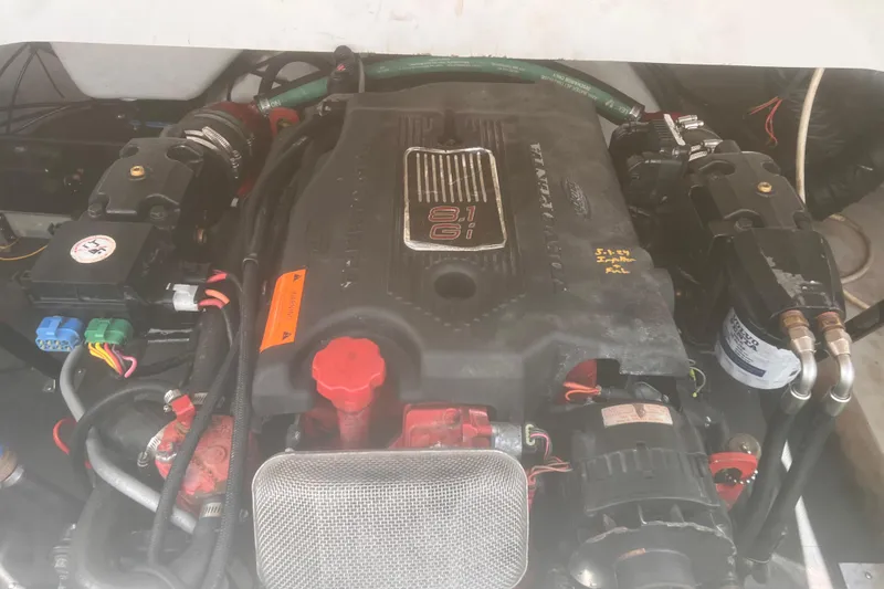 Slide: The Image of 2003 Coblat 263 engine compartment with visible components and wiring. - 24