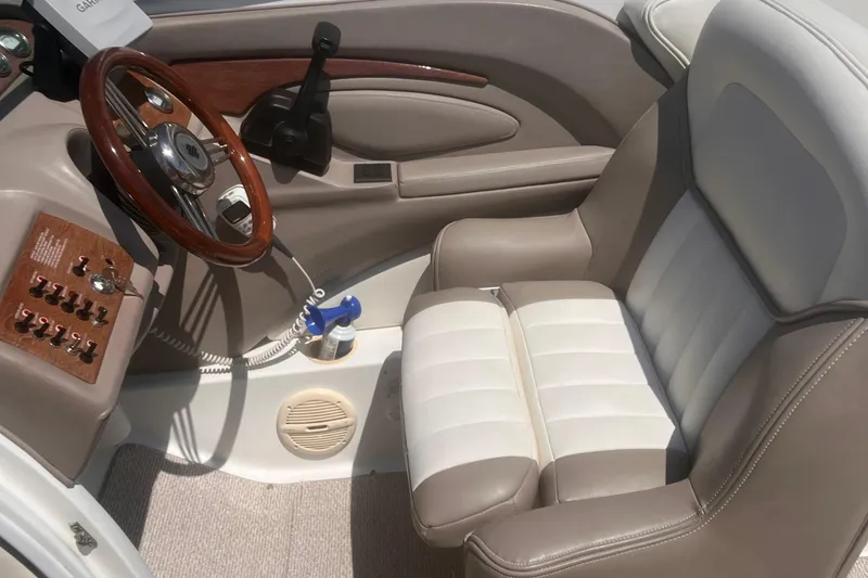 Slide: The Image of Luxury boat interior with leather seating and wooden steering wheel, Cobalt 263, 2003 model. - 7