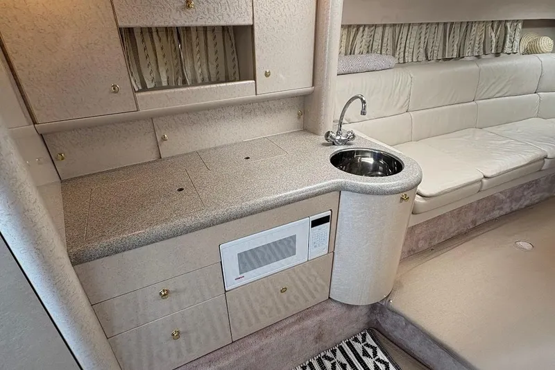 Slide: The Image of 2001 Formula 400ss boat on calm water, side view with trees in background. - 17