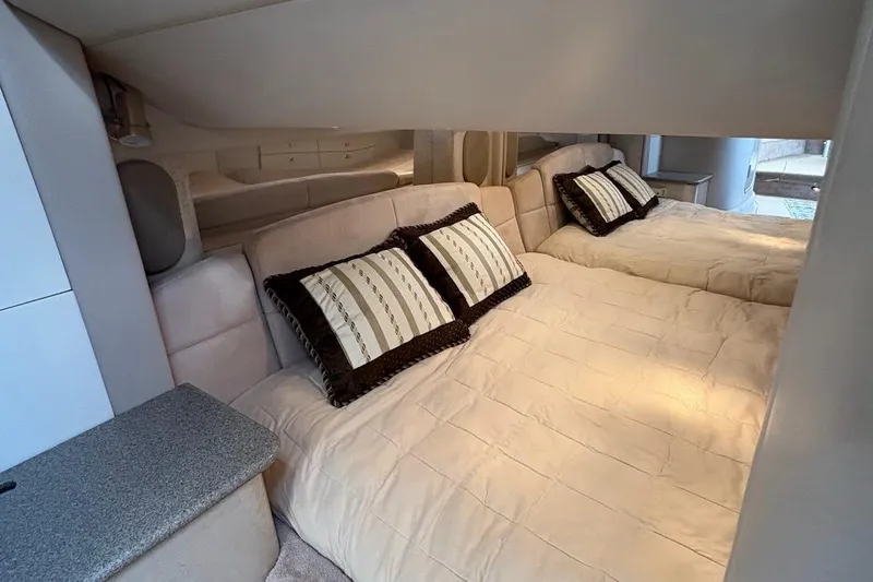 Slide: The Image of 2001 Formula 400ss yacht docked at marina, surrounded by other boats. - 18