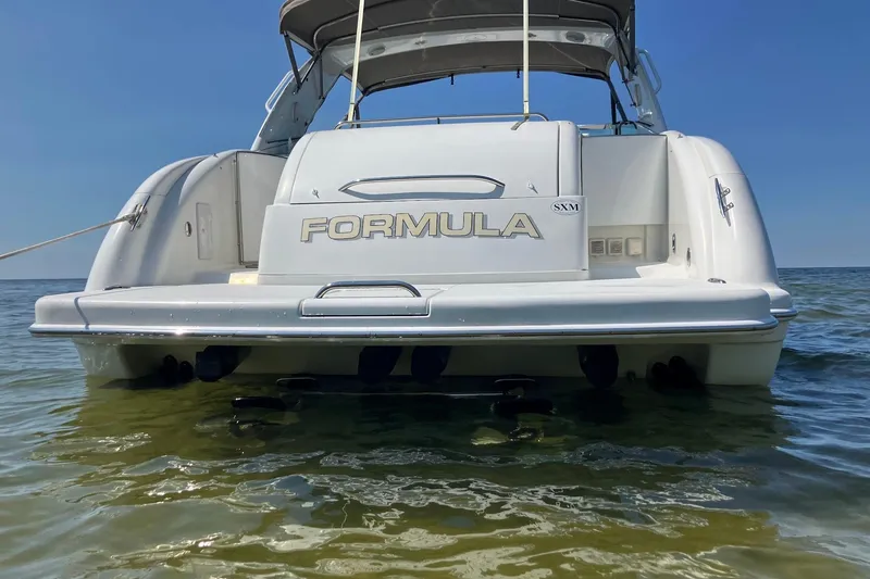 Slide: The Image of Dashboard of a 2001 Formula 400ss boat with navigation and control instruments. - 3